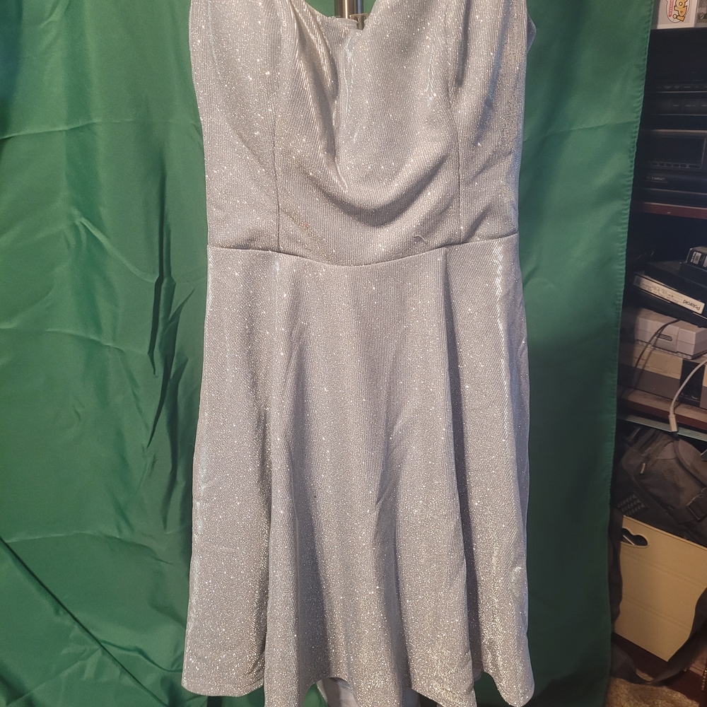 B. Smart Glittering Silver Backless Dress